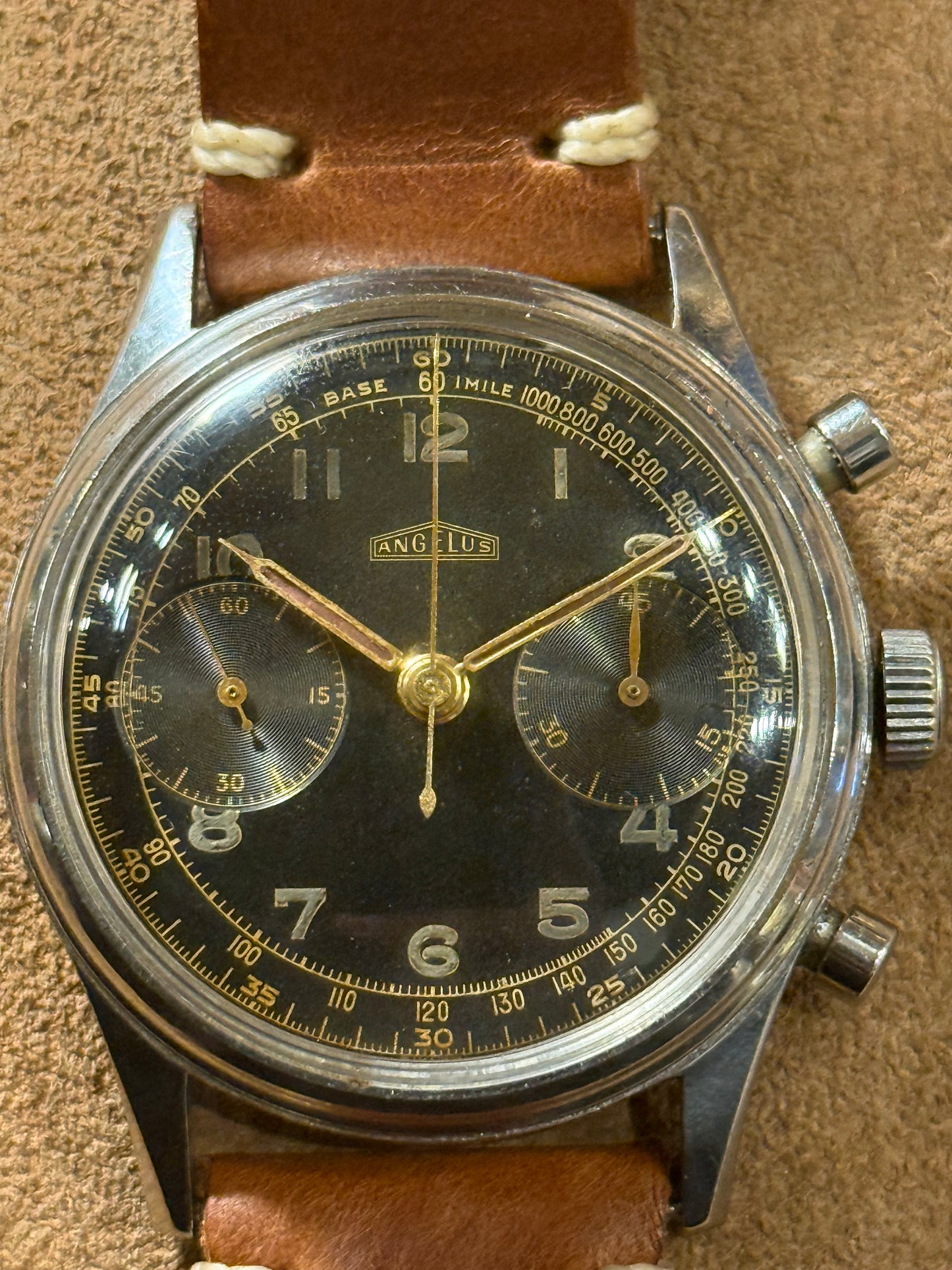 Angelus Chronograph Cal 215 Gilt dial watch from the 1950s.