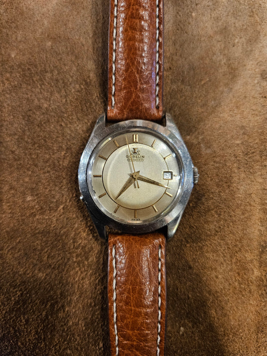 Gubelin Ipso Date stainless steel watch from the 1950s