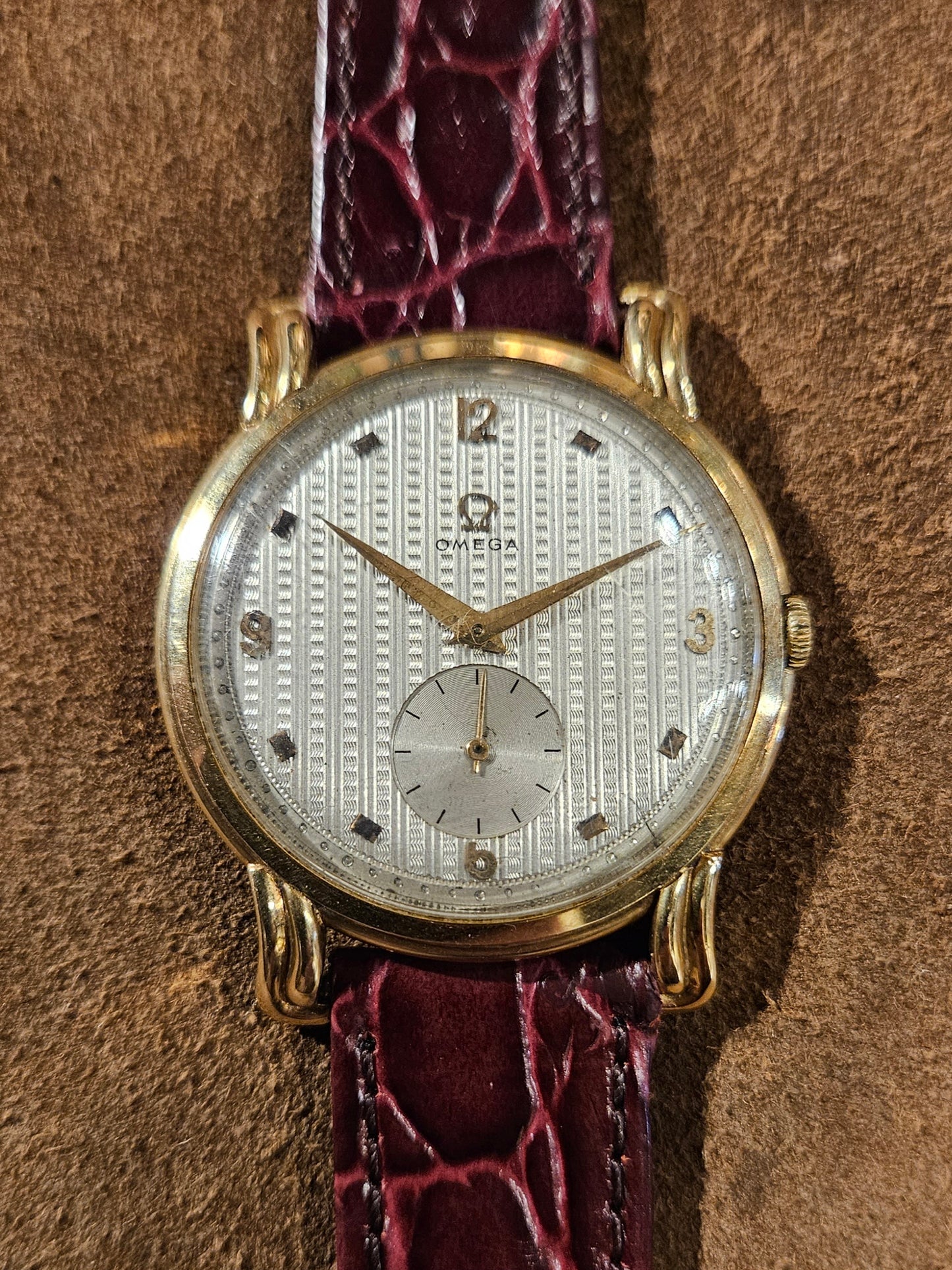 Omega 18kt Oversized case Ornate lugs Guilloche dial watch from the 1950s