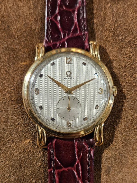 Omega 18kt Oversized case Ornate lugs Guilloche dial watch from the 1950s