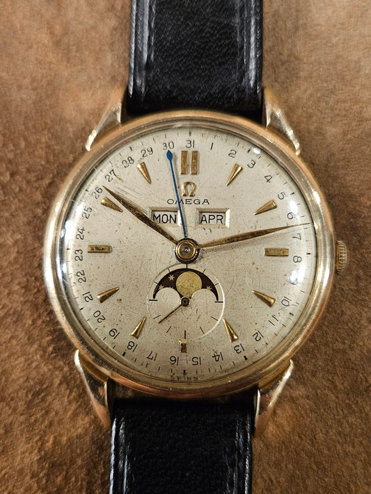 Omega Cosmo 2486 moon phase triple calendar watch from the 1940s