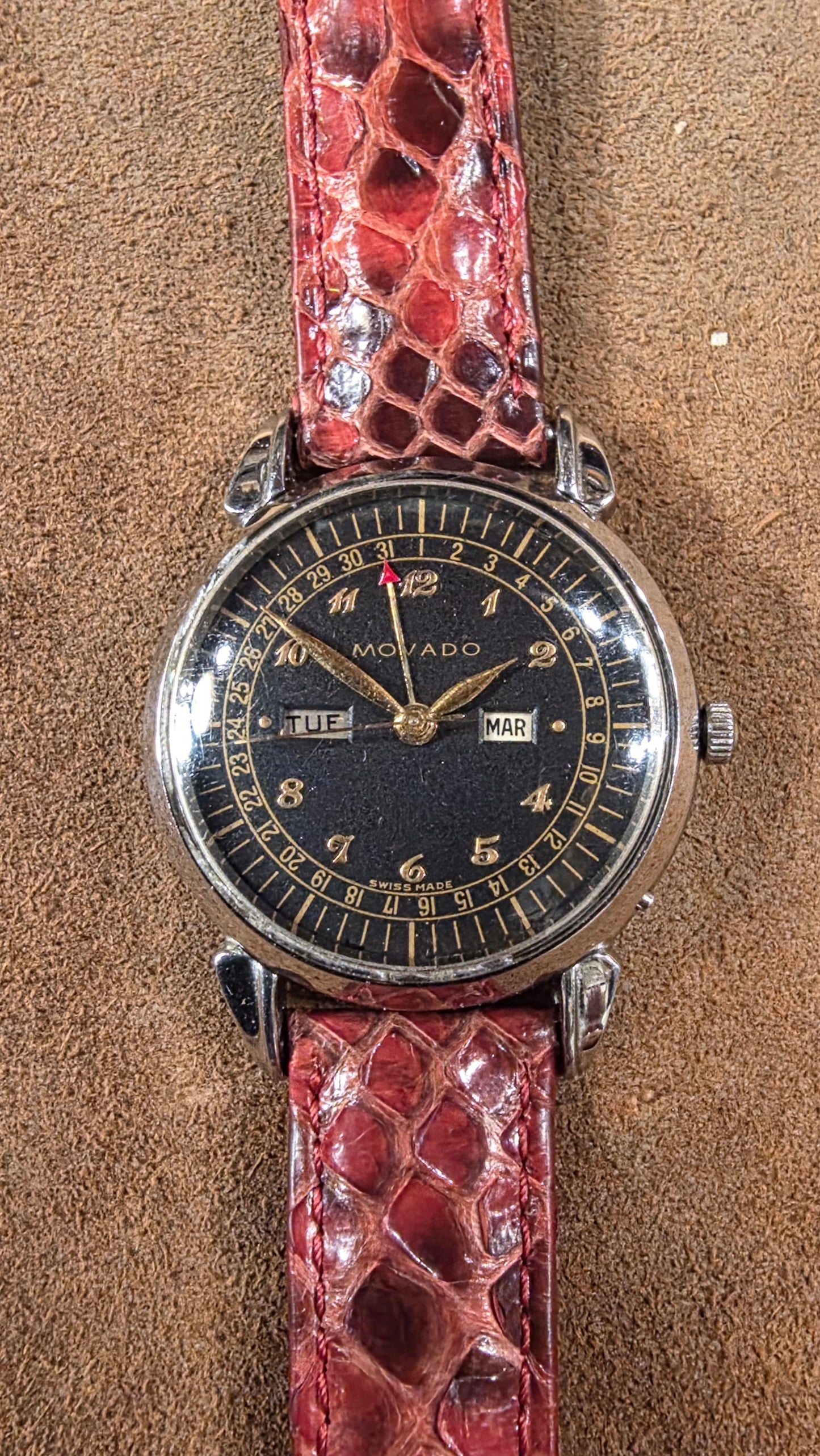 Movado triple date calender steel watch from the 1950s
