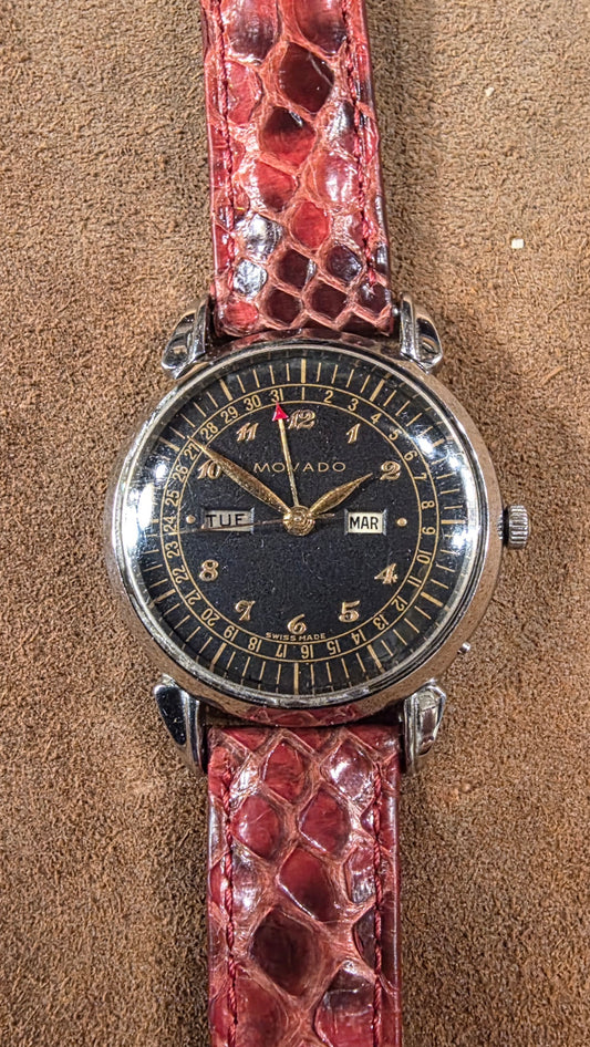 Movado triple date calender steel watch from the 1950s
