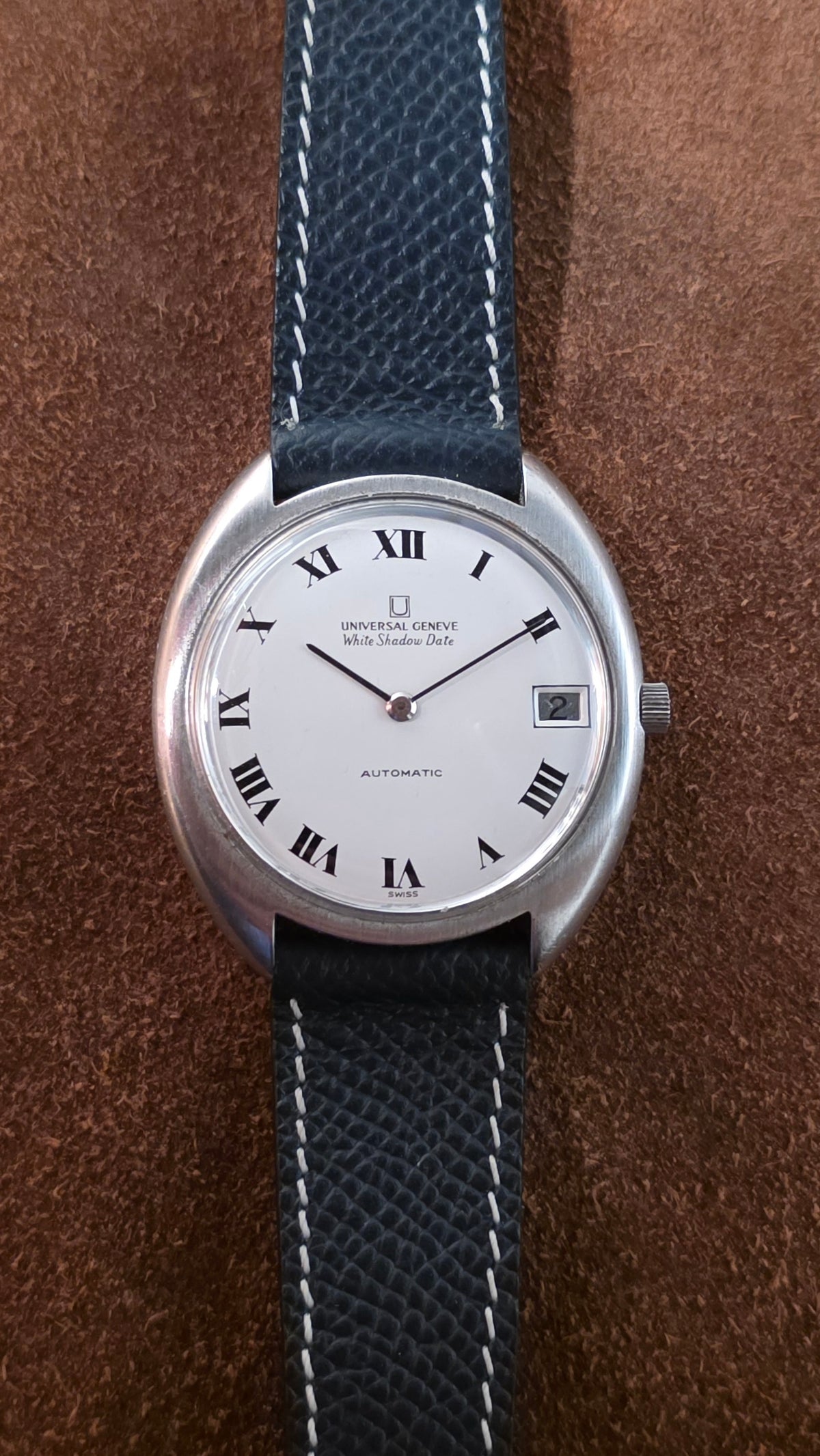 Universal Geneve White shadow date watch from the 1960s