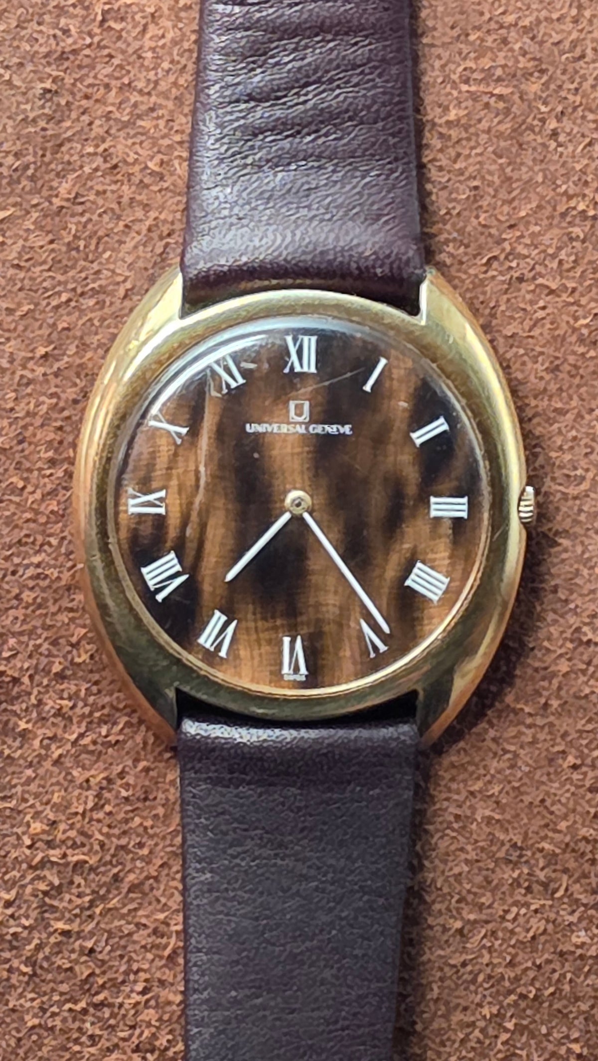 Universal Geneve  Gilt Shadow Tiger eye watch from the 1970s.